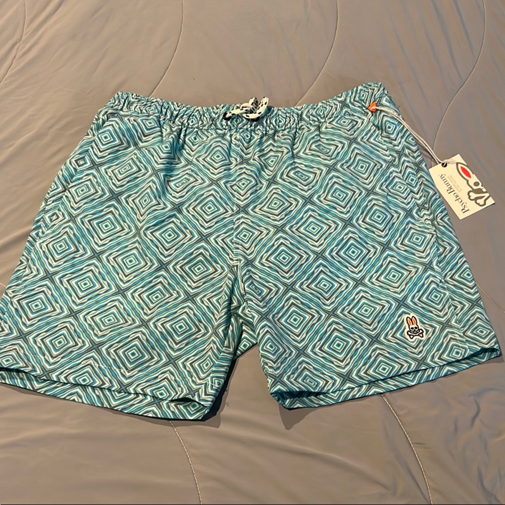 Psycho Bunny Blue and White Swim Trunks with Geometric Design